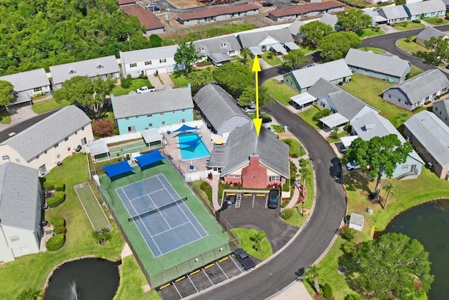 aerial view featuring a water view and a residential view