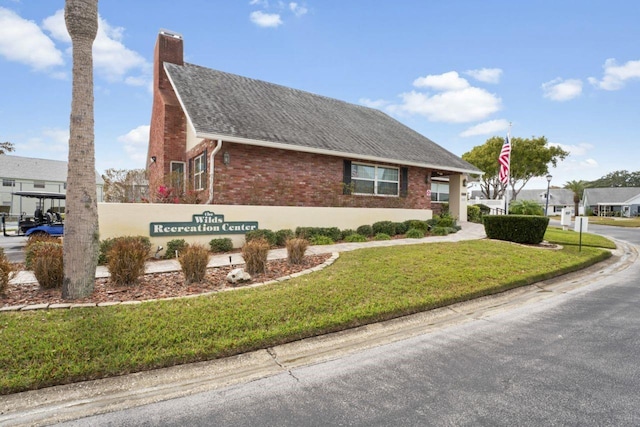 exterior space with a lawn