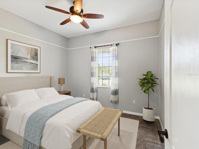 10318 Piper Dr, New Port Richey, FL 34654 - carpeted bedroom with baseboards and ceiling fan