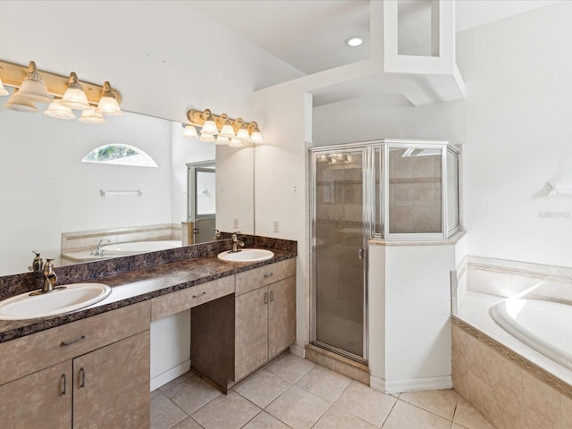 10318 Piper Dr, New Port Richey, FL 34654 - bathroom with tile patterned floors, a shower stall, double vanity, and a sink