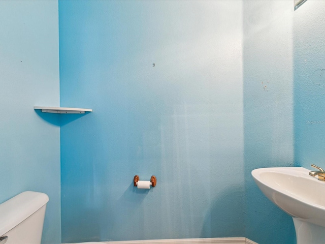 10318 Piper Dr, New Port Richey, FL 34654 - bathroom featuring toilet and a sink