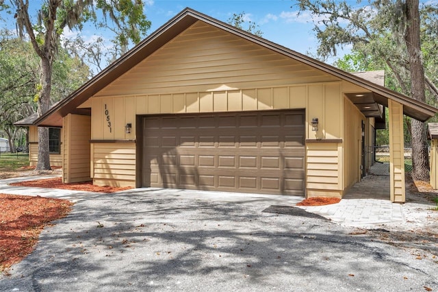 exterior space with aphalt driveway