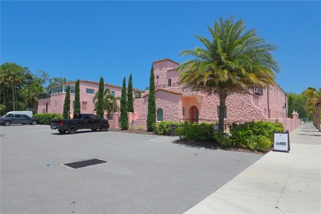 10531 Lakeview Dr, New Port Richey, FL 34654 - view of building exterior featuring uncovered parking