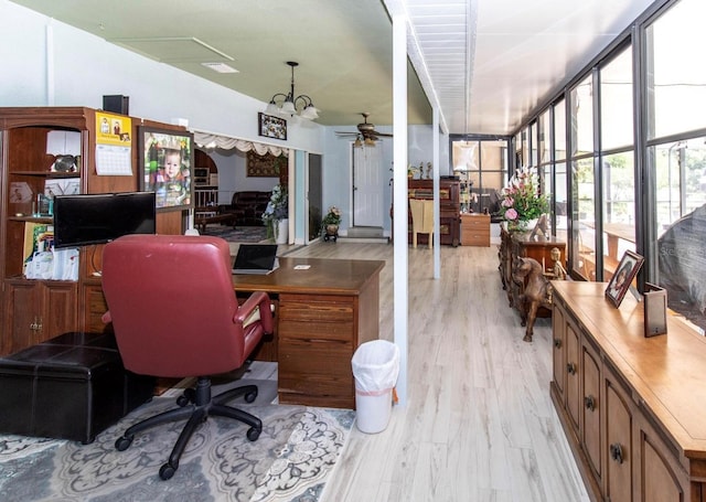office space featuring light wood-style flooring and a ceiling fan