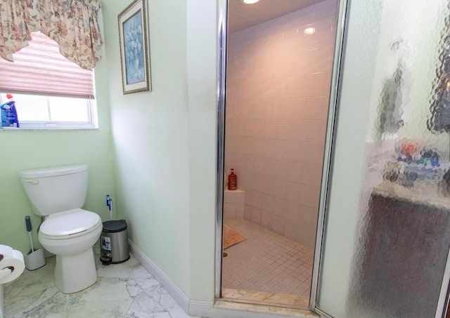 full bath with baseboards, a stall shower, recessed lighting, toilet, and marble finish floor