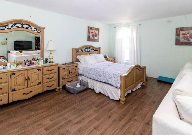 bedroom featuring dark wood-style floors