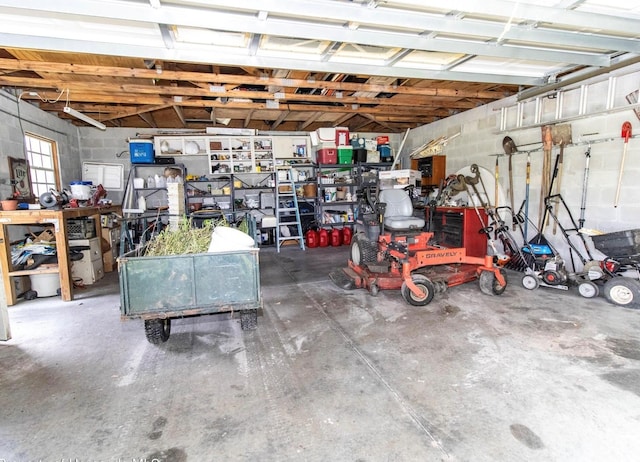garage with concrete block wall