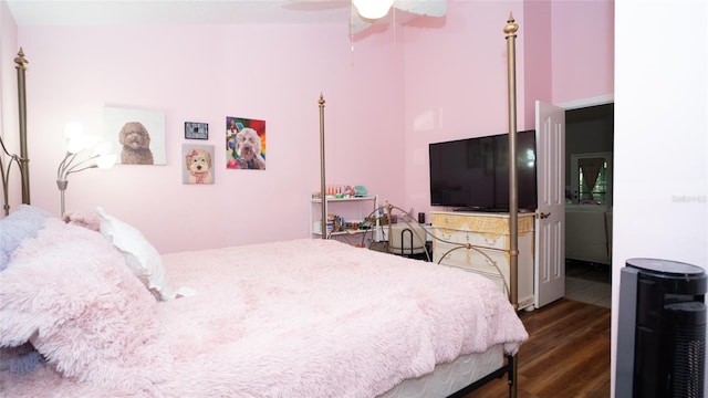 bedroom featuring dark wood-style flooring and ceiling fan
