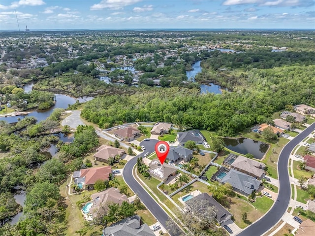 6109 Japonica Ct, New Port Richey, FL 34655 - aerial view featuring a water view and a residential view
