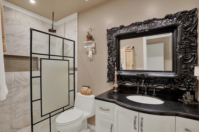 full bathroom featuring walk in shower, vanity, and toilet