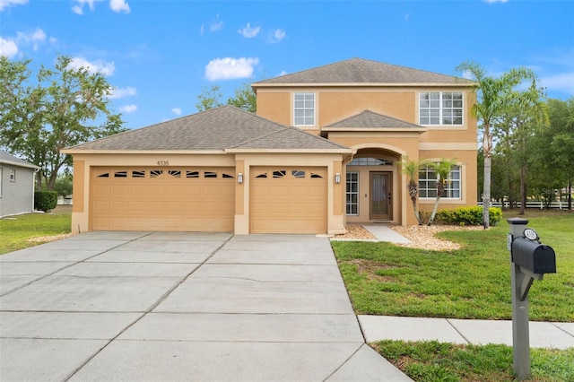 4335 Canongate Ct, Spring Hill, FL 34609 - mediterranean / spanish home with stucco siding, a garage, driveway, a front lawn, and roof with shingles