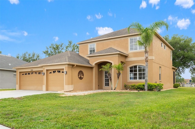 4335 Canongate Ct, Spring Hill, FL 34609 - mediterranean / spanish-style house with stucco siding, concrete driveway, an attached garage, a front yard, and a shingled roof