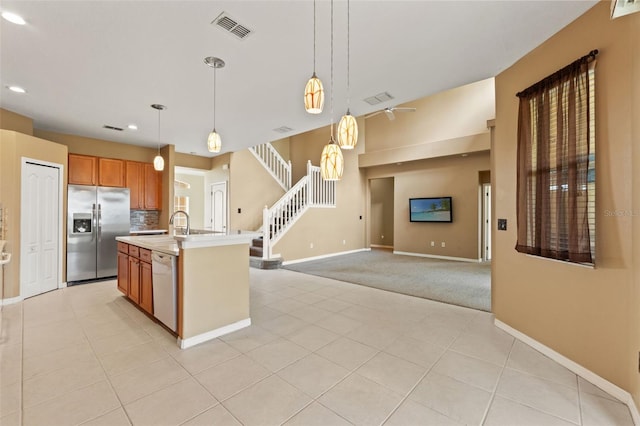 4335 Canongate Ct, Spring Hill, FL 34609 - kitchen featuring stainless steel refrigerator with ice dispenser, white dishwasher, baseboards, brown cabinetry, and recessed lighting