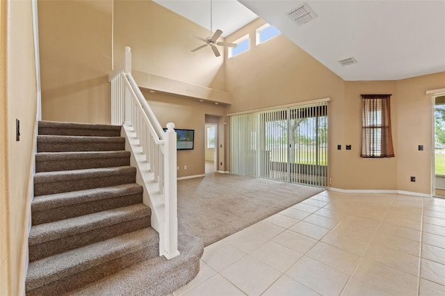 4335 Canongate Ct, Spring Hill, FL 34609 - foyer entrance with plenty of natural light, ceiling fan, light tile patterned floors, baseboards, and a high ceiling