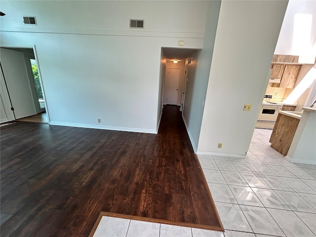 7444 Candlelight Ct, New Port Richey, FL 34652 - spare room with wood finished floors and baseboards