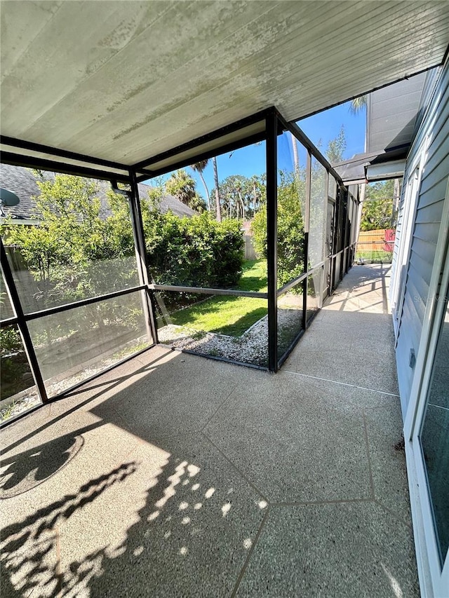 7444 Candlelight Ct, New Port Richey, FL 34652 - unfurnished sunroom featuring healthy amount of natural light