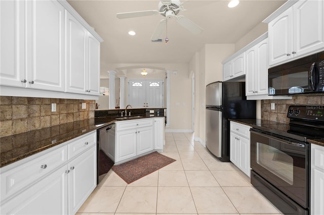 4407 Caliquen Dr, Brooksville, FL 34604 - kitchen with ceiling fan, ornate columns, white cabinetry, black appliances, and a sink