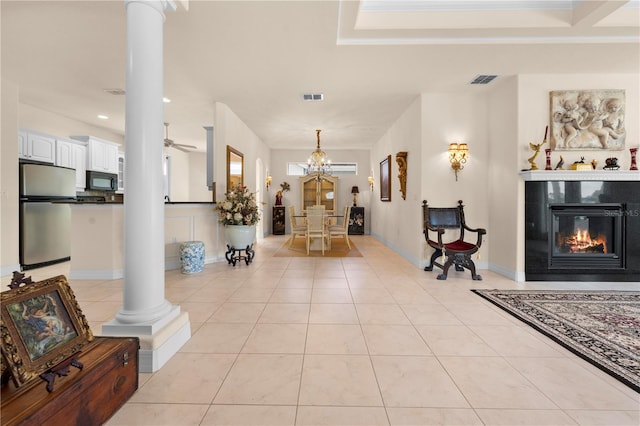 4407 Caliquen Dr, Brooksville, FL 34604 - entrance foyer with visible vents, recessed lighting, decorative columns, and light tile patterned floors