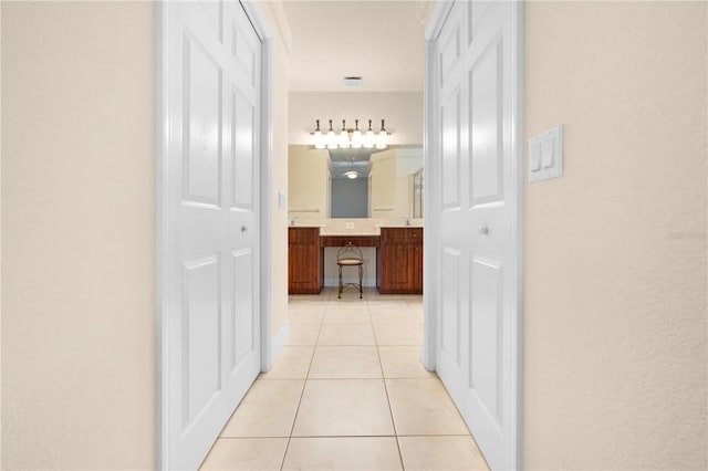 4407 Caliquen Dr, Brooksville, FL 34604 - hallway with light tile patterned flooring