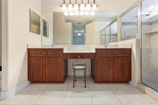 4407 Caliquen Dr, Brooksville, FL 34604 - full bath featuring baseboards, double vanity, a shower stall, visible vents, and a sink