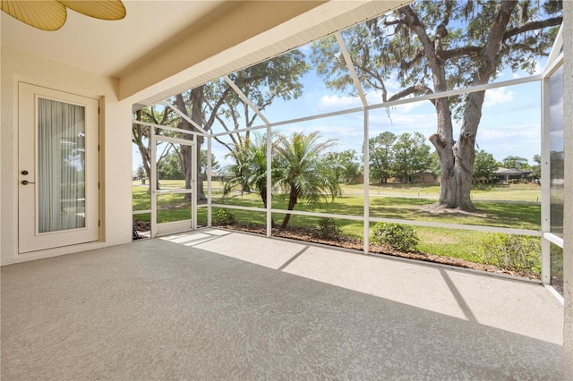 4407 Caliquen Dr, Brooksville, FL 34604 - unfurnished sunroom with a ceiling fan