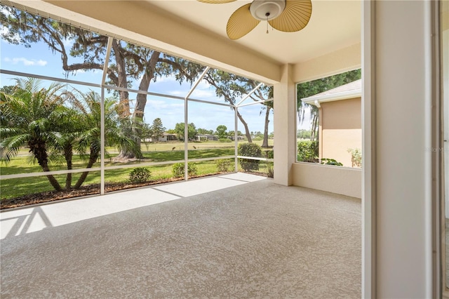 4407 Caliquen Dr, Brooksville, FL 34604 - unfurnished sunroom featuring ceiling fan
