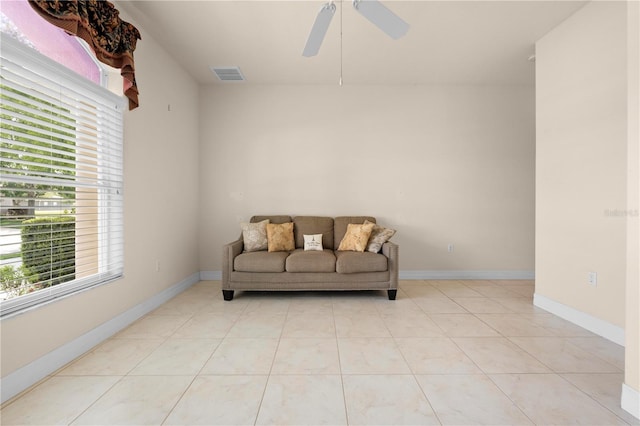 4407 Caliquen Dr, Brooksville, FL 34604 - sitting room featuring light tile patterned flooring, ceiling fan, baseboards, and visible vents
