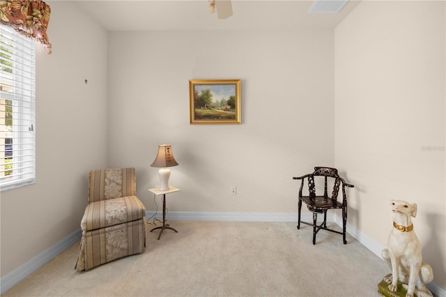 4407 Caliquen Dr, Brooksville, FL 34604 - living area with carpet floors, baseboards, and plenty of natural light