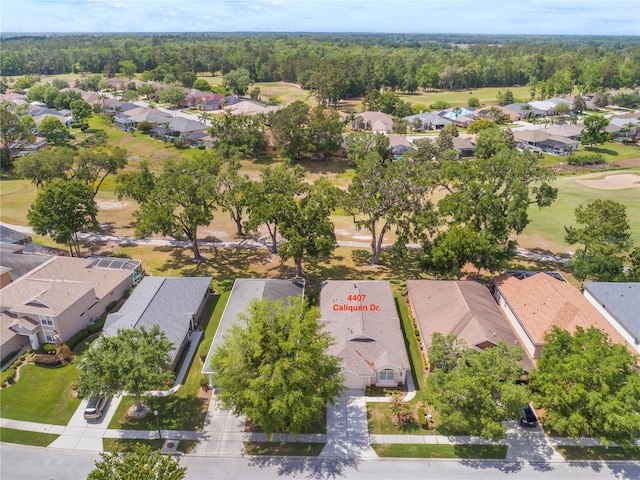 4407 Caliquen Dr, Brooksville, FL 34604 - bird's eye view with view of golf course and a residential view