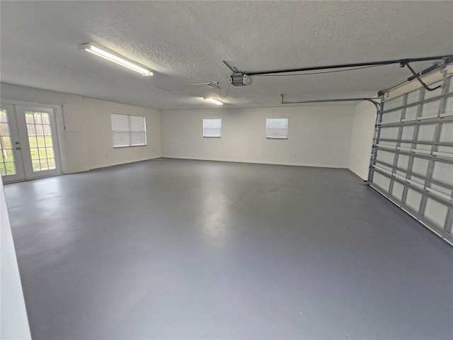 18232 Monteverde Dr, Spring Hill, FL 34610 - garage with a garage door opener and french doors