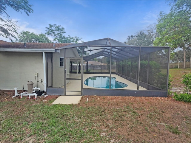 18232 Monteverde Dr, Spring Hill, FL 34610 - view of swimming pool with a fenced in pool, a patio, and a lanai