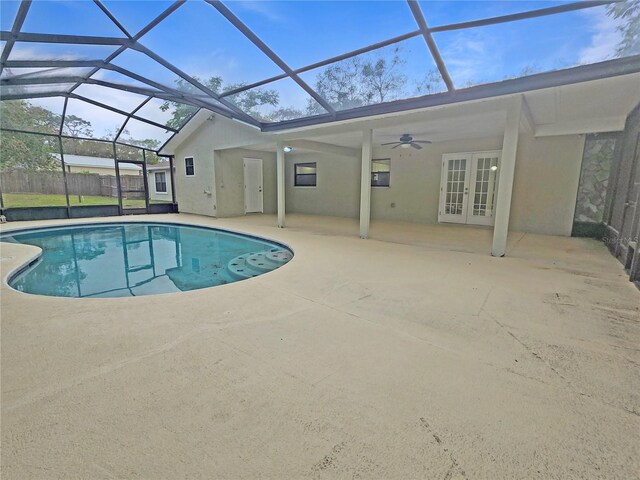 18232 Monteverde Dr, Spring Hill, FL 34610 - outdoor pool with a patio, french doors, ceiling fan, glass enclosure, and fence