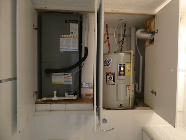 utilities featuring heating unit and electric water heater
