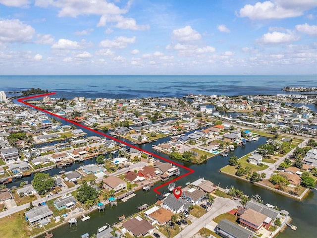 13815 Plumosa Ave, Hudson, FL 34667 - aerial view featuring a water view and a residential view
