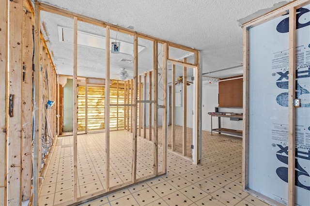 13815 Plumosa Ave, Hudson, FL 34667 - misc room featuring tile patterned floors and a textured ceiling