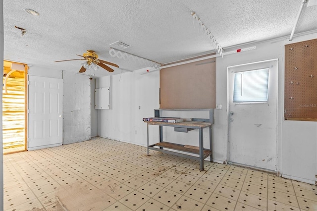 13815 Plumosa Ave, Hudson, FL 34667 - interior space with a textured ceiling, ceiling fan, visible vents, and tile patterned floors