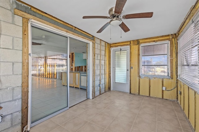 13815 Plumosa Ave, Hudson, FL 34667 - unfurnished sunroom featuring a ceiling fan