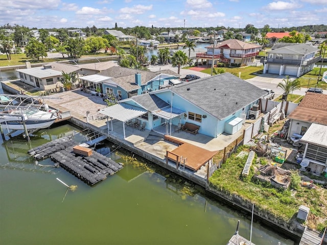 13815 Plumosa Ave, Hudson, FL 34667 - drone / aerial view featuring a water view and a residential view