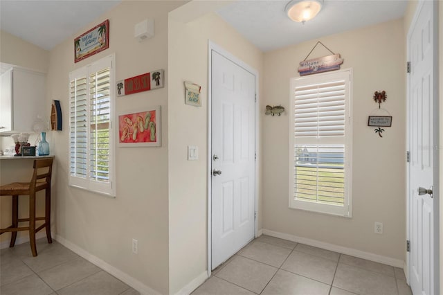 11274 W Cove Harbor Dr Unit 11274, Crystal River, FL 34428 - foyer entrance with light tile patterned flooring and baseboards