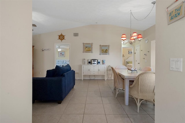 11274 W Cove Harbor Dr Unit 11274, Crystal River, FL 34428 - dining area featuring lofted ceiling, a chandelier, light tile patterned flooring, and a ceiling fan