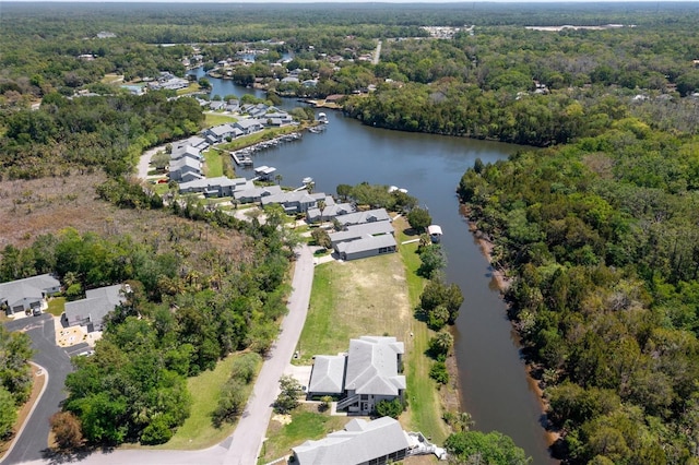11274 W Cove Harbor Dr Unit 11274, Crystal River, FL 34428 - aerial overview of property's location with a nearby body of water, a heavily wooded area, and nearby suburban area