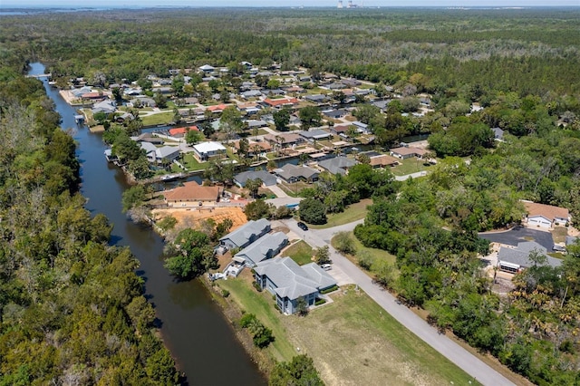 11274 W Cove Harbor Dr Unit 11274, Crystal River, FL 34428 - aerial view of property and surrounding area featuring a heavily wooded area, a nearby body of water, and nearby suburban area