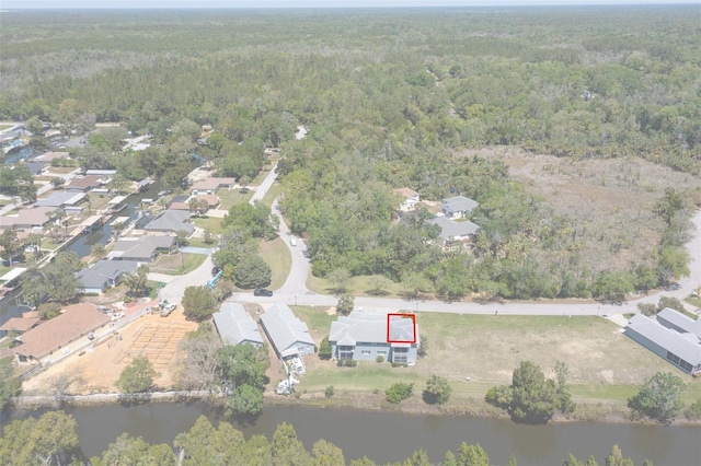 11274 W Cove Harbor Dr Unit 11274, Crystal River, FL 34428 - aerial view of property and surrounding area featuring a heavily wooded area and a nearby body of water