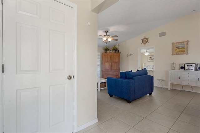11274 W Cove Harbor Dr Unit 11274, Crystal River, FL 34428 - living area featuring ceiling fan, light tile patterned floors, and baseboards