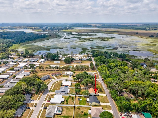 bird's eye view featuring a residential view and a water view