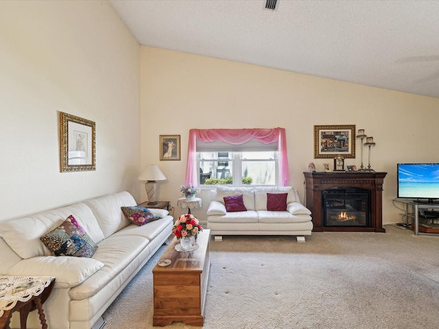 11536 Golden Rain Dr, New Port Richey, FL 34654 - carpeted living room with lofted ceiling and a glass covered fireplace
