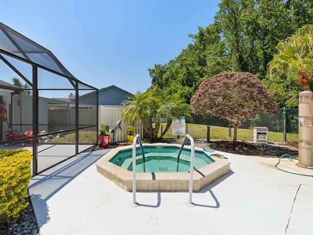 11536 Golden Rain Dr, New Port Richey, FL 34654 - view of pool with a hot tub, fence, glass enclosure, and a patio