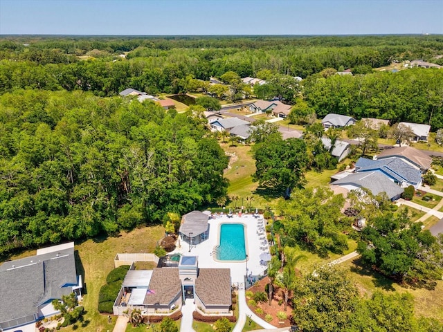 11536 Golden Rain Dr, New Port Richey, FL 34654 - aerial view of a forest and a pool