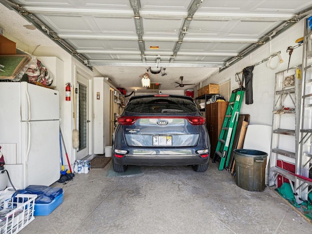 11536 Golden Rain Dr, New Port Richey, FL 34654 - garage with freestanding refrigerator