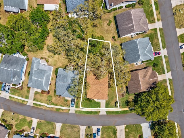 11536 Golden Rain Dr, New Port Richey, FL 34654 - aerial perspective of suburban area featuring property parcel outlined